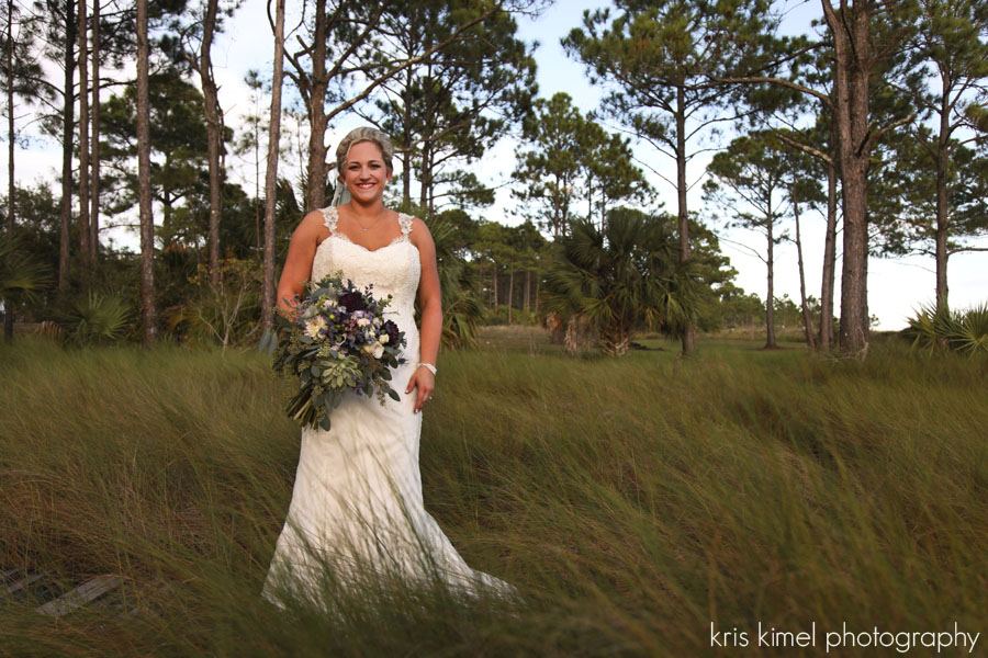 bridal portrait in grasses in Carabelle, FL  