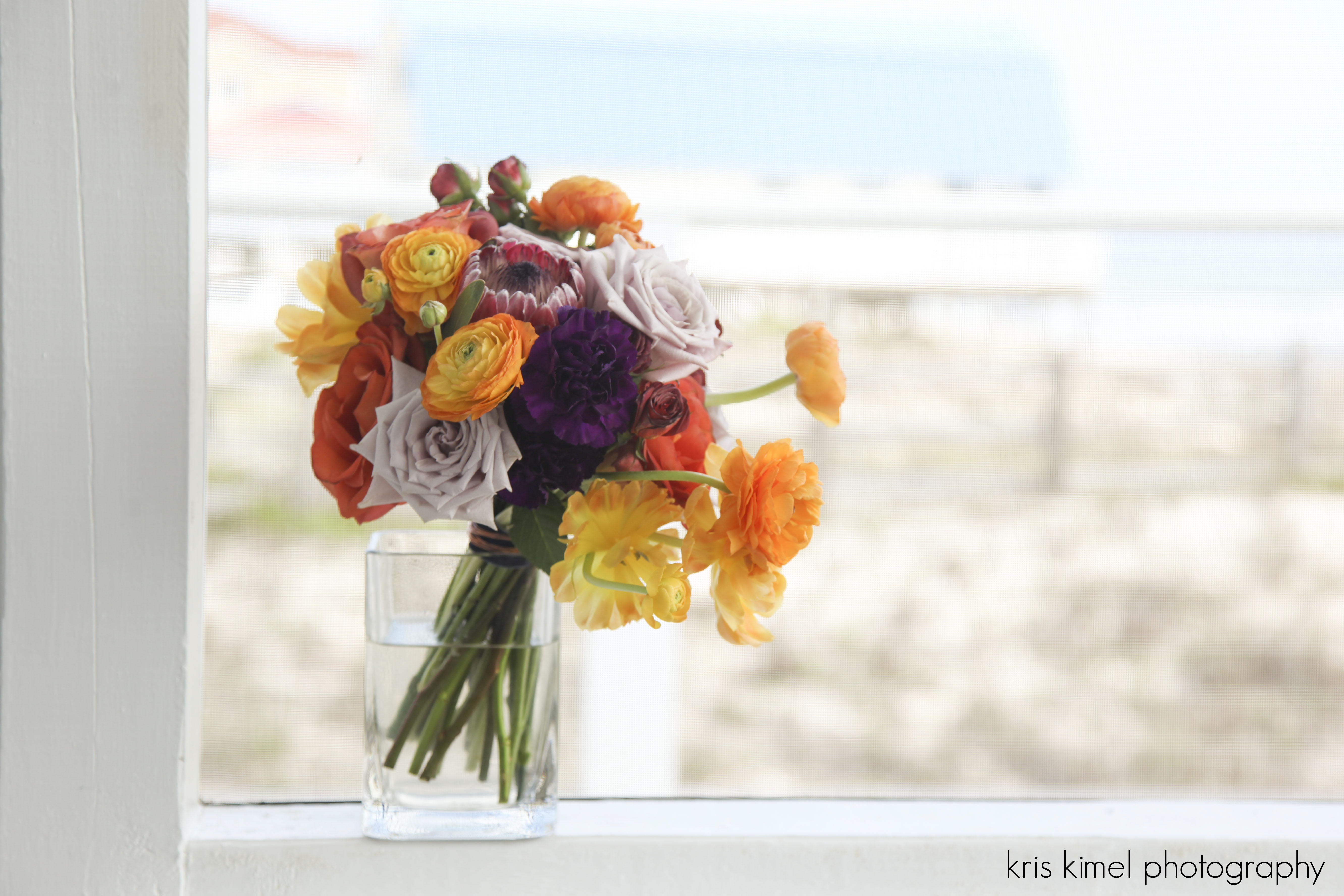 Colorful wedding bouquet created by South of Stem
