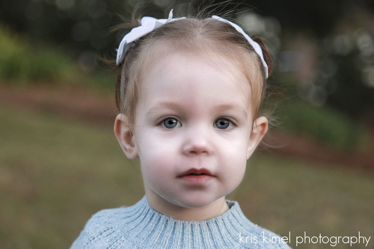Close-up portrait of a toddler by Kris Kimel Photography